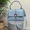 Borsa cuciture azzurra